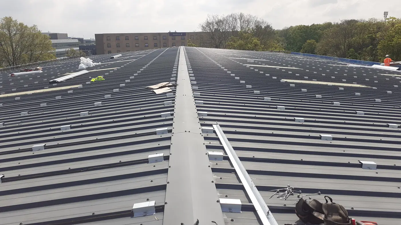 New ridge along the overclad roof